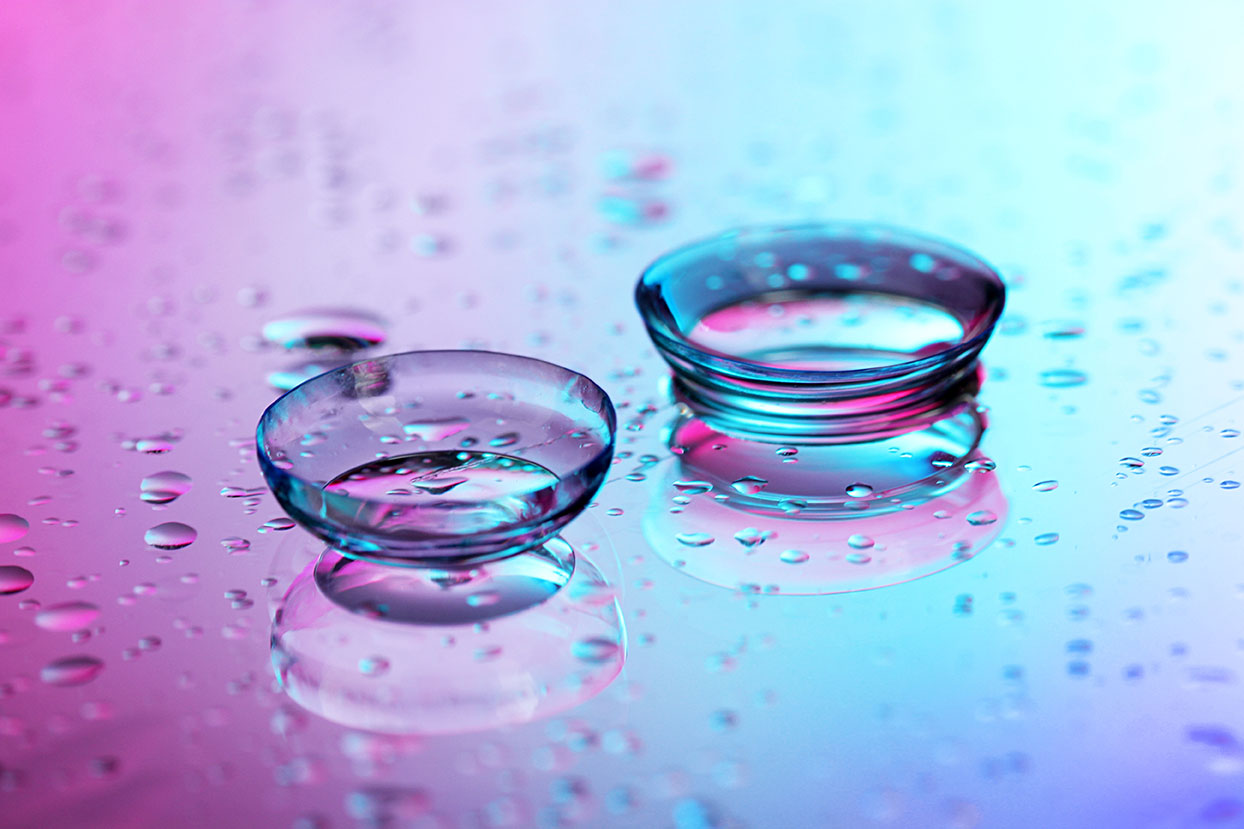 contact lenses, on pink-blue background